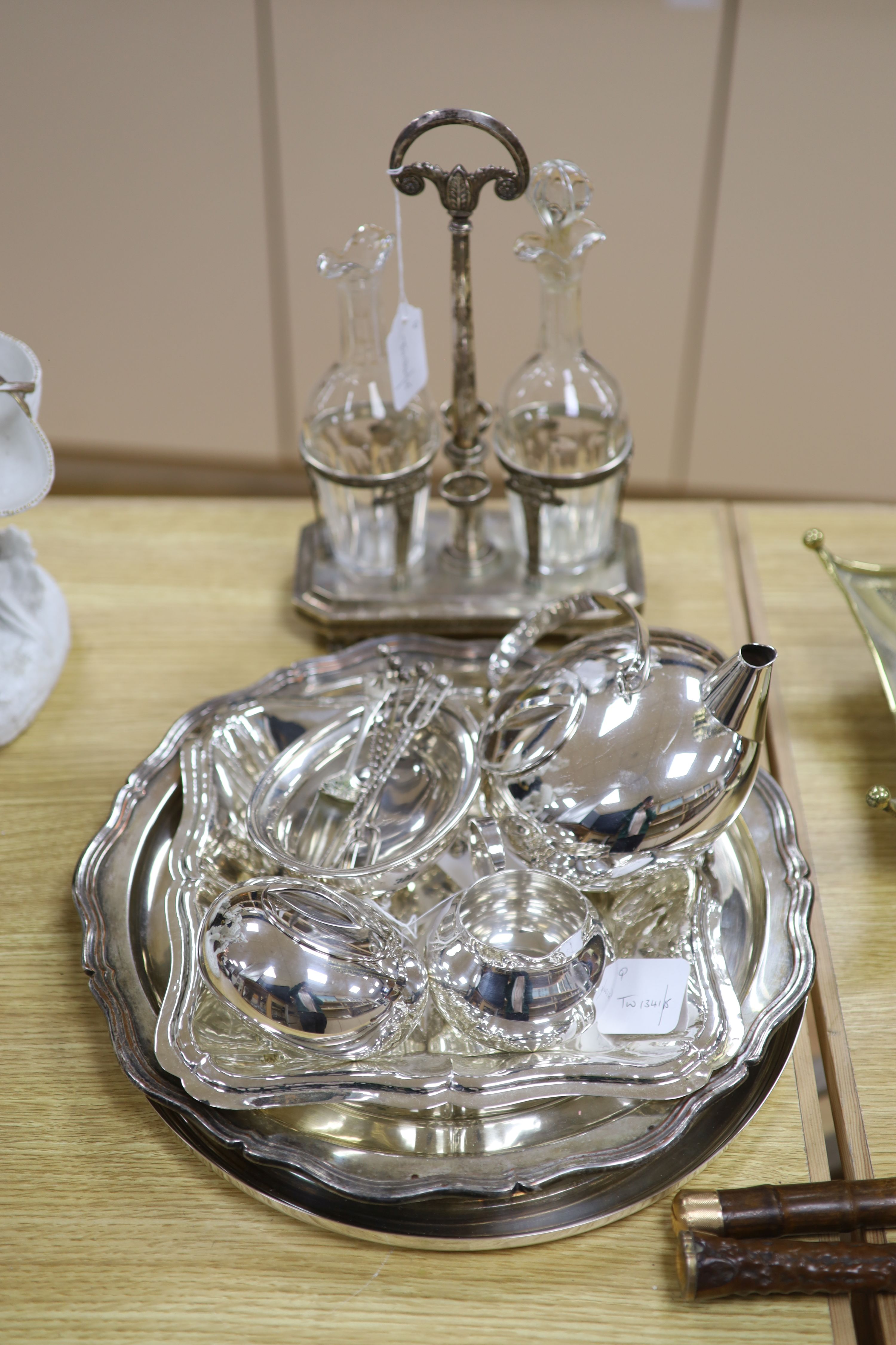 A Christofle Art Deco plated three-piece teaset and tray (pot handle a.f.) and sundry plated items,